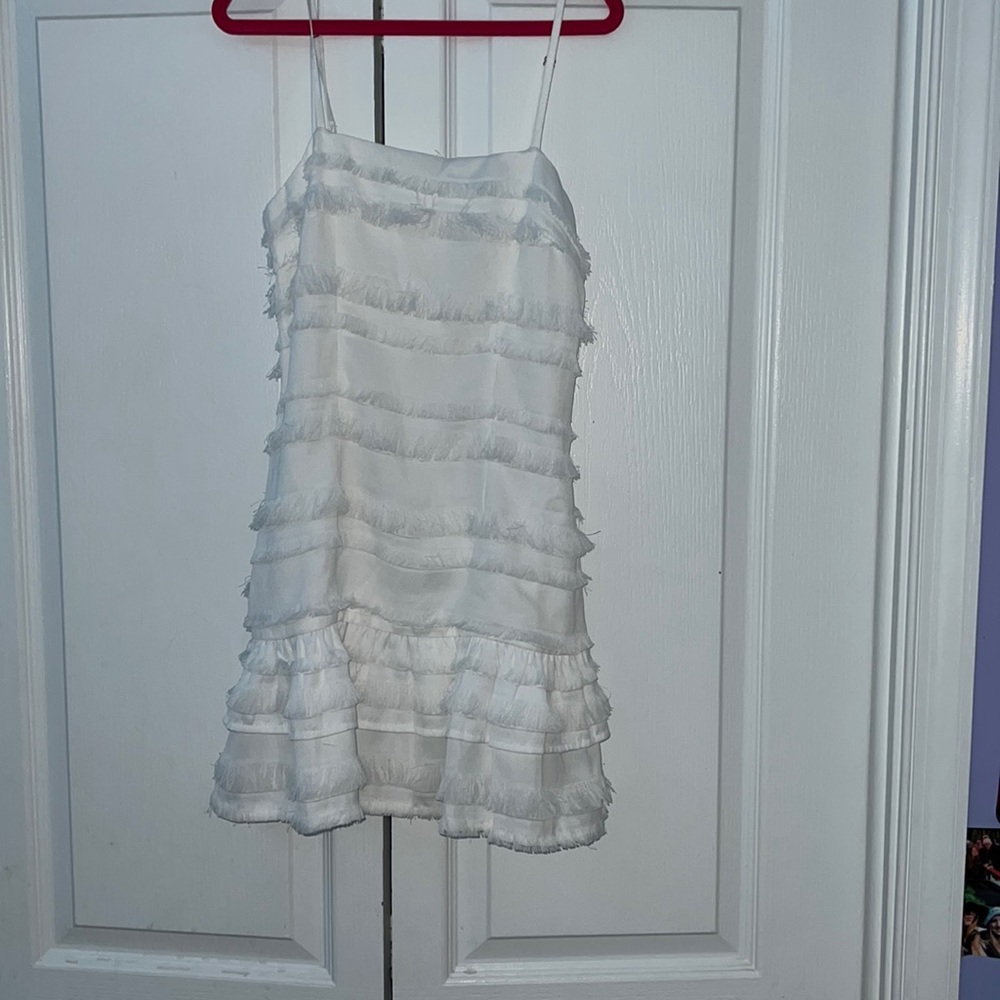 Brand new Princess Polly dress. Size 0. White ruffled. Has tags on.